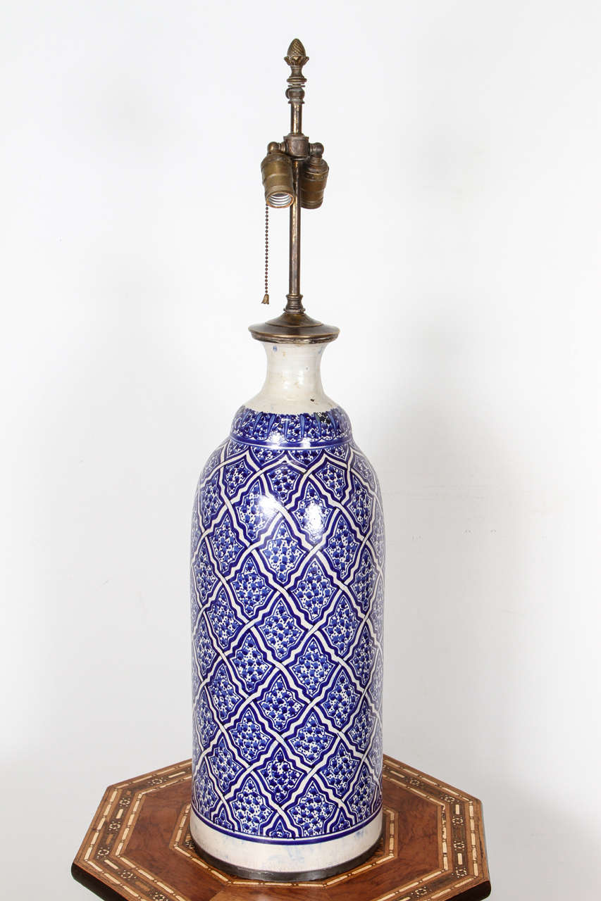 Pair of Blue Moroccan Ceramic Table Lamps from Fez.
Amazing Bleu de Fez, handcrafted ceramics, hand painted with geometrical and foliage designs in blue and white.
This pair of ceramic are turned into table lamps. Just add the shade that will