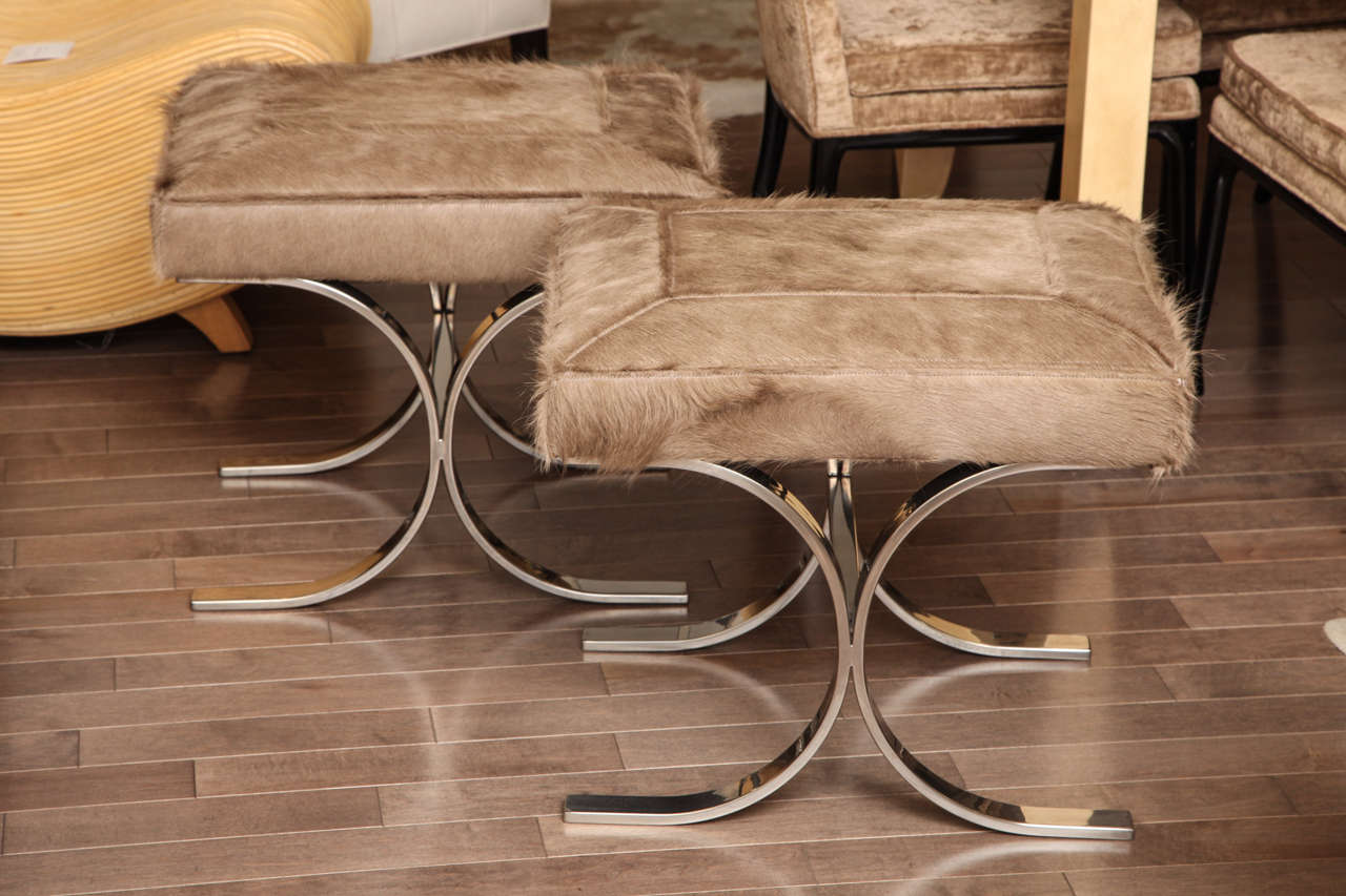 Pair of chrome X base stools upholstered in taupe cowhide, c. 1970