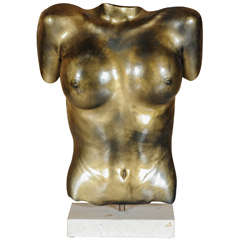 gold painted signed bronze torso with back light on marble stand