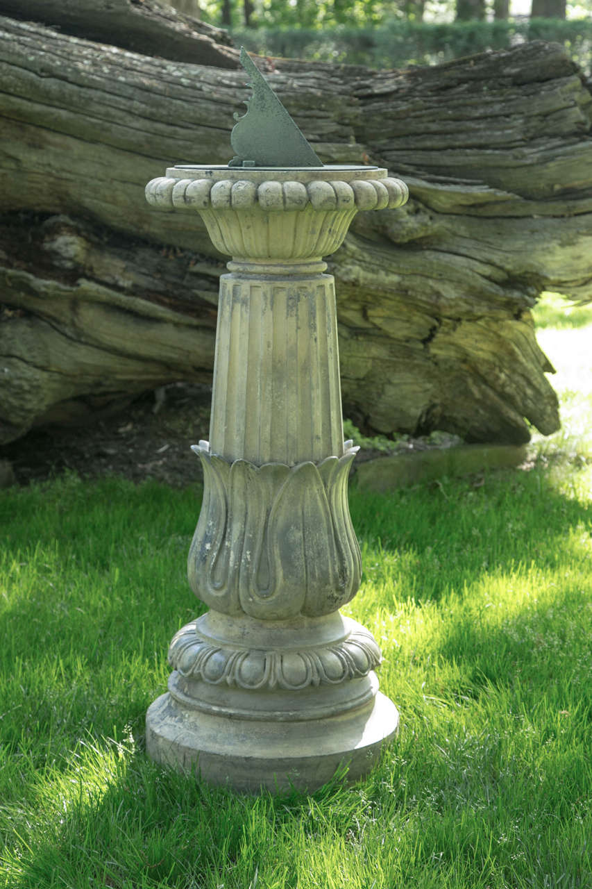 A terra-cotta pedestal with stiff leaf decoration and fluted baluster, similar to design appearing in J. C. Loudon's Encyclopedia of Cottage, Farm and Villa Architecture and Furniture (London, 1835), English, ca. 1890, with associated earlier bronze
