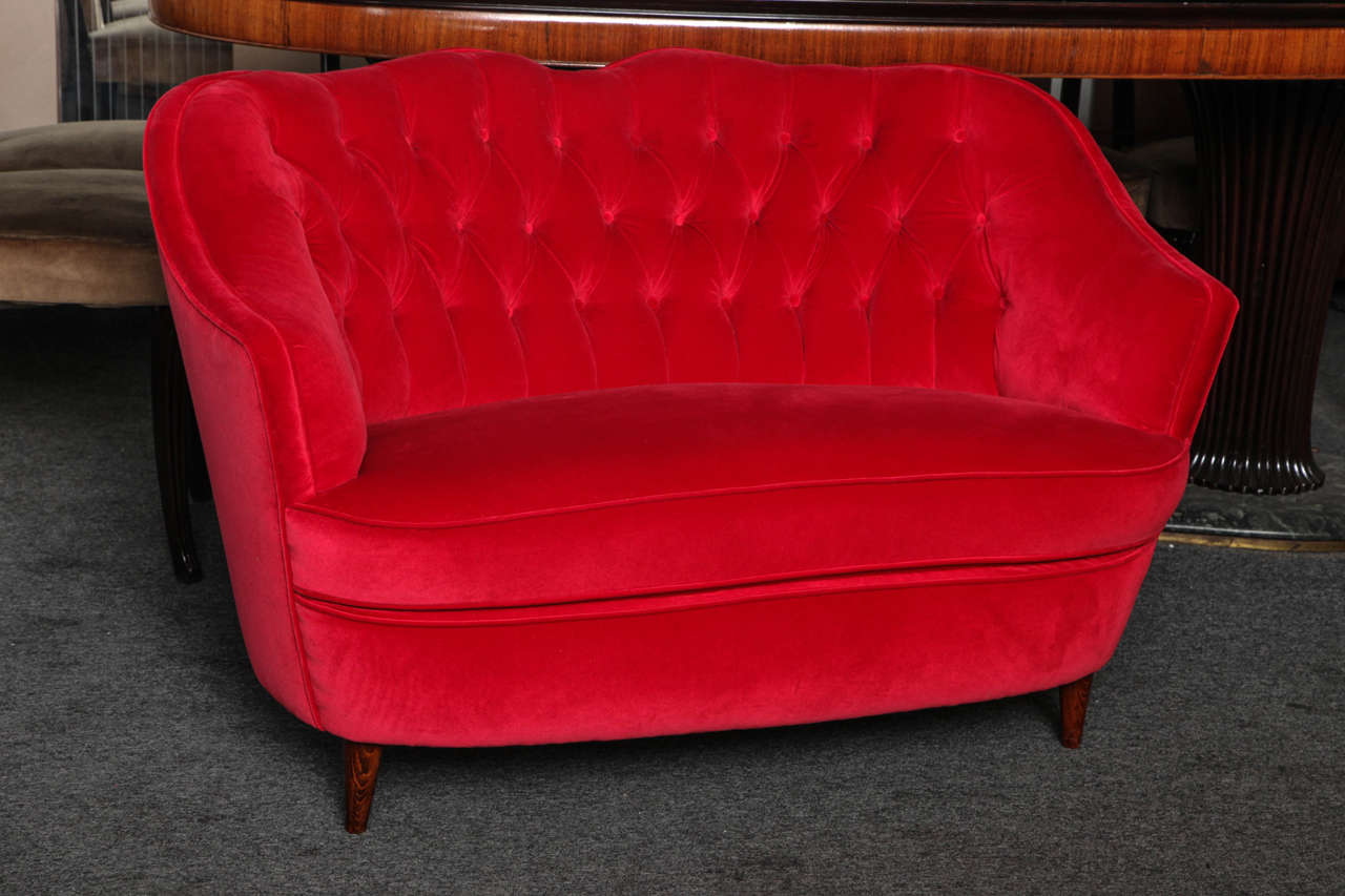 Fabulous small loveseat made in Milan 1950 by Pierino Busnelli, it is one of his earlier works prior to establishing his company in 1966 which became known as B&B Italia, signed on the wood frame, great quality pleasantly proportioned.
 