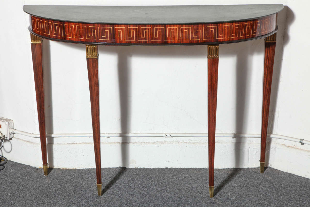 Stunning console designed by Paolo Buffa made in Italy 1948. Palisander with Greek key satin wood inlay, knee and foot in bronze top in antique Verdi marble, nice small size, great quality.