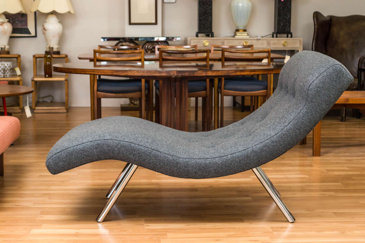 Super curvy vintage lounger, in the style of Adrian Persall designs. This one has been reupholstered in a Gray Wool and legs have been re-chromed.
Very easy to take a nap in this one...