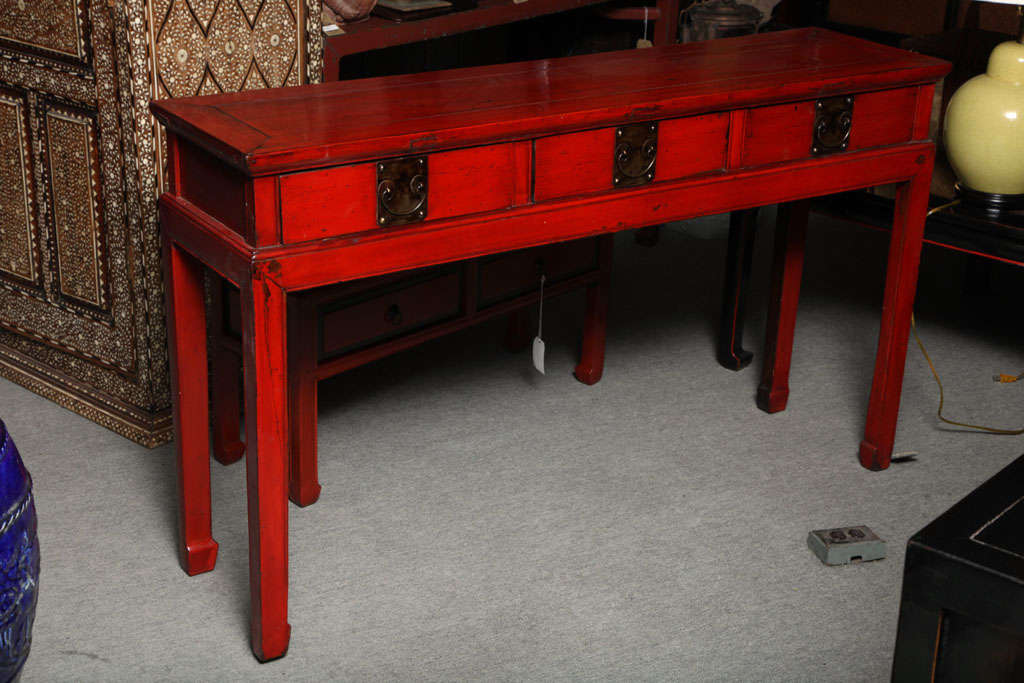 Elmwood Desk/console table with original red lacquered finish. 19th cent. China.