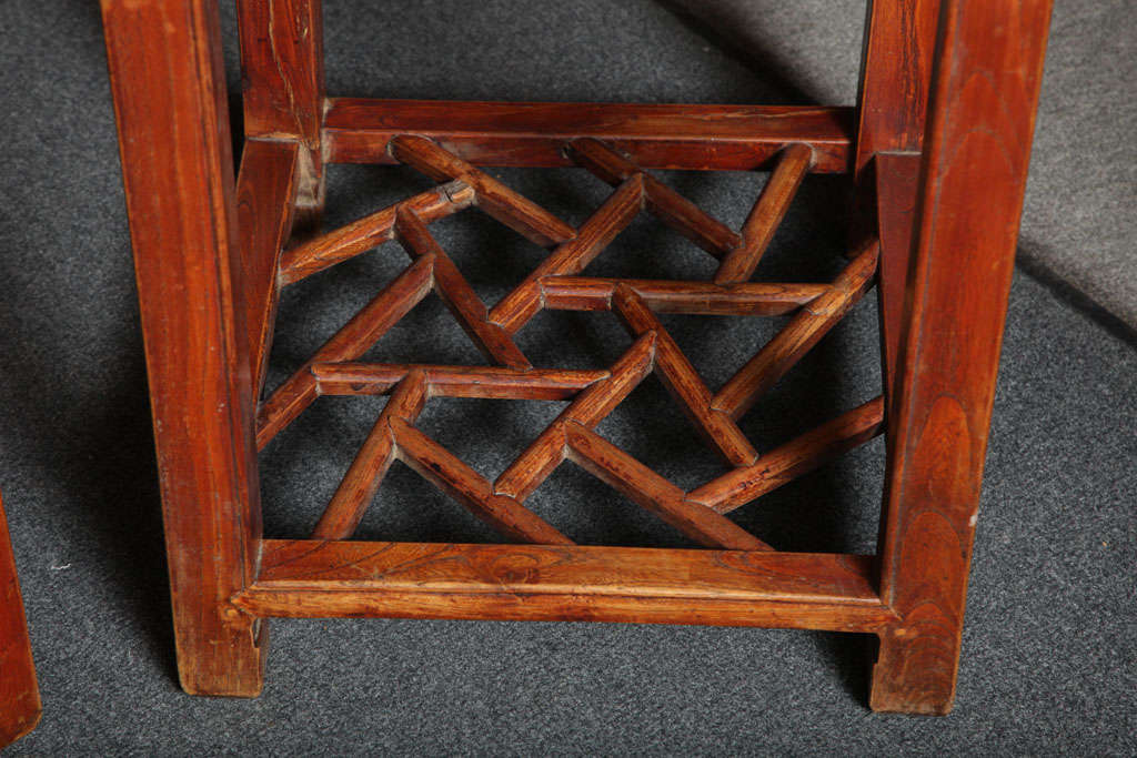 Pair of Late Qing Dynasty Elmwood Pedestal Tables with Openwork Stretcher In Good Condition In Yonkers, NY