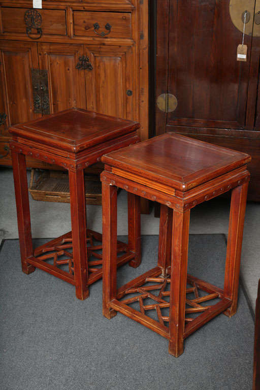 Pair of Late Qing Dynasty Elmwood Pedestal Tables with Openwork Stretcher 2