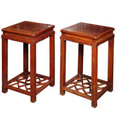 Antique Pair of Late Qing Dynasty Elmwood Pedestal Tables with Openwork Stretcher