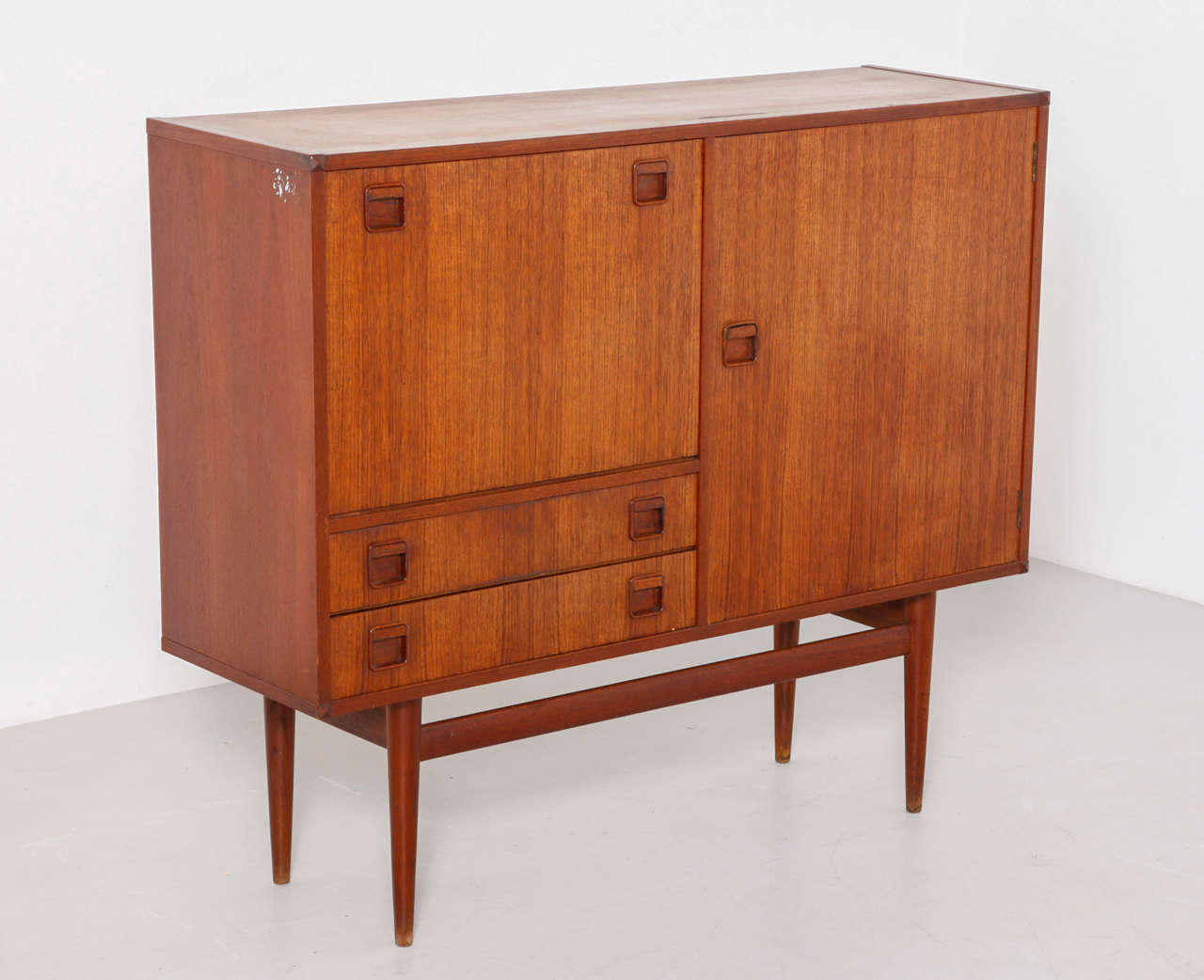 Oswald Vermaercke Highboard with a bar element inside for V-Form Gent. Early sixties in teak,good original condition.