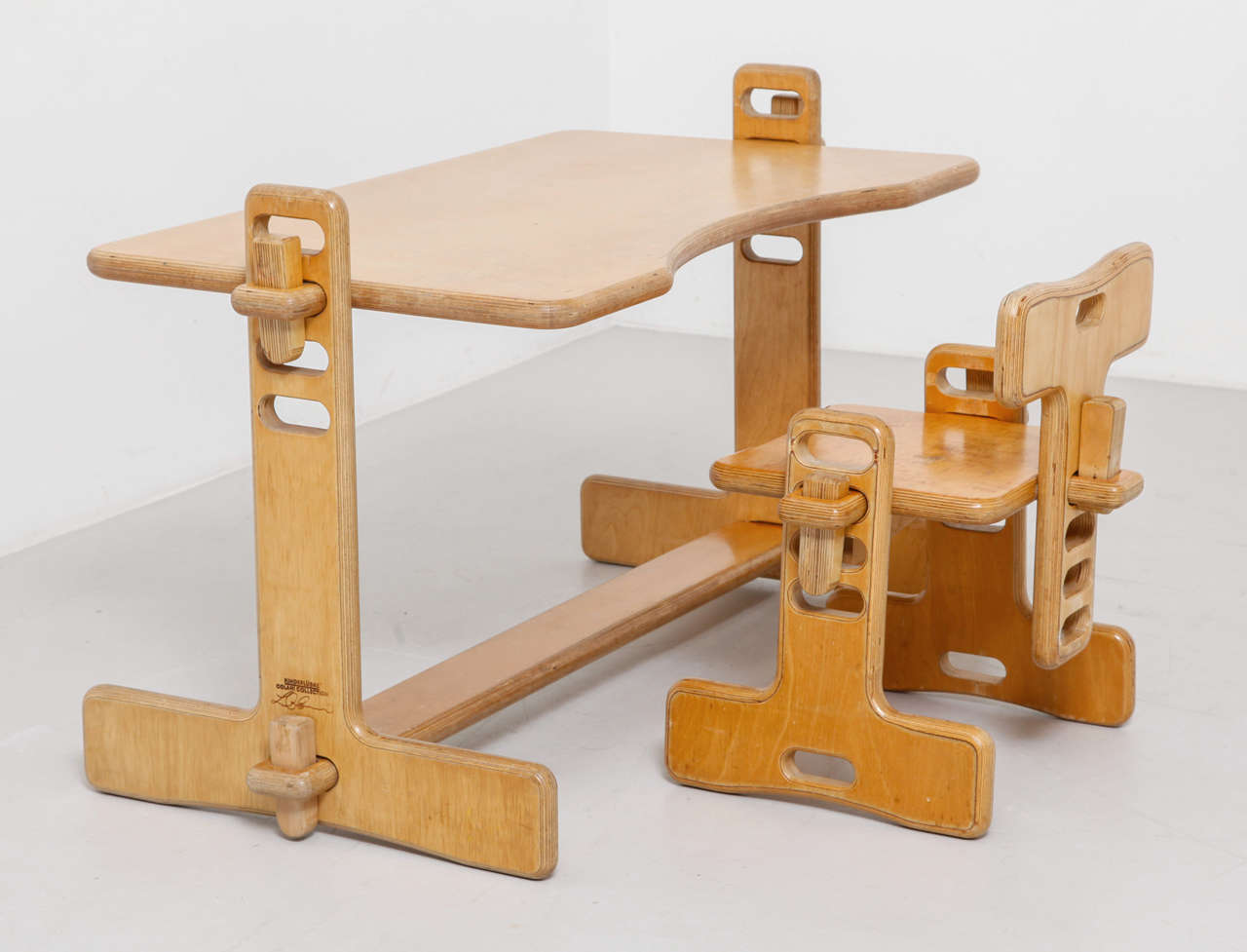 Luigi Colani. 'Tobifant' child's writing desk and chair, designed in 1977. 
Desk: H. 64 x 114 x 60 cm; chair: H. 55 x 55 x 41 cm. Made by Kinderlübke, Rheda-WiedenbrŸck. 
Birch plywood.
