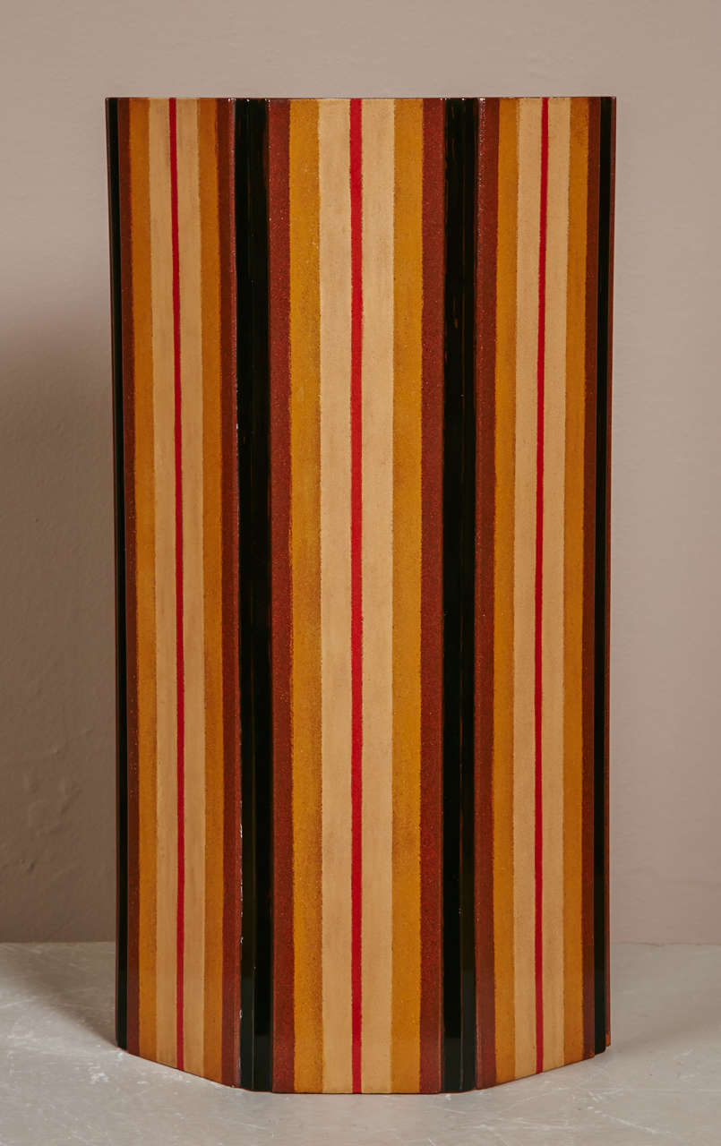 A Japanese wooden vase with stripe design in several lacquer colors . Signed A box for storage .