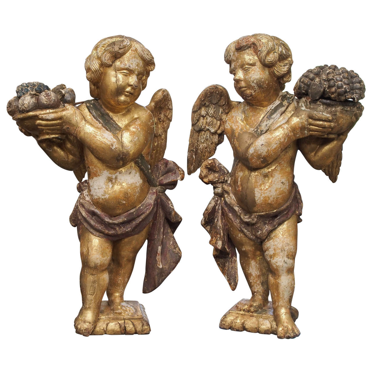Pair of Italian 18th Century Giltwood and Painted Putti For Sale