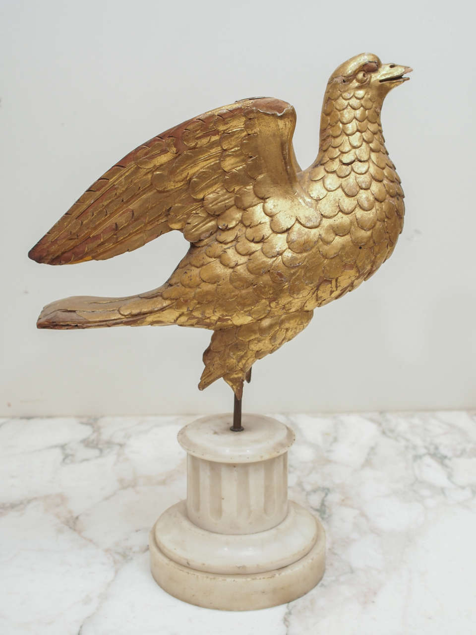 Gilt Wood Pigeon that the legs have been broken off now mounted on a Napoleon III White Marble Fluted Columnar Base