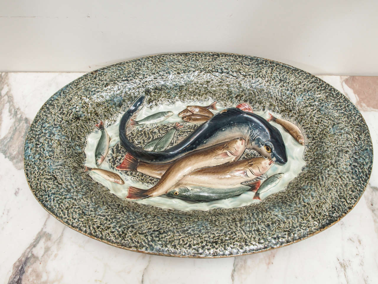 Pair of large scale majolica plates in the style of Bernard Palissy. Having various fish and shell fish.