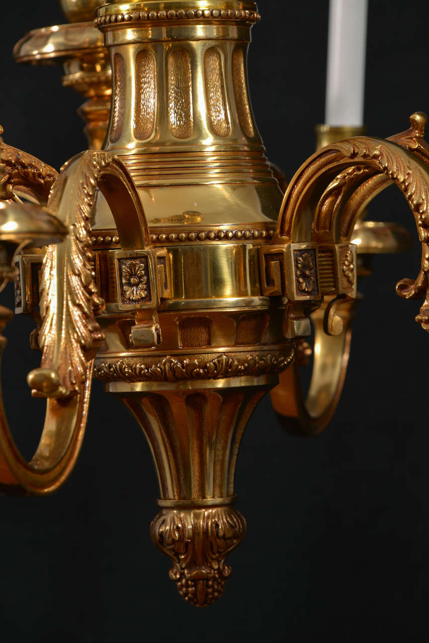 Mid-20th Century Nine Light, Simple Georgian Cast Brass Chandelier For Sale