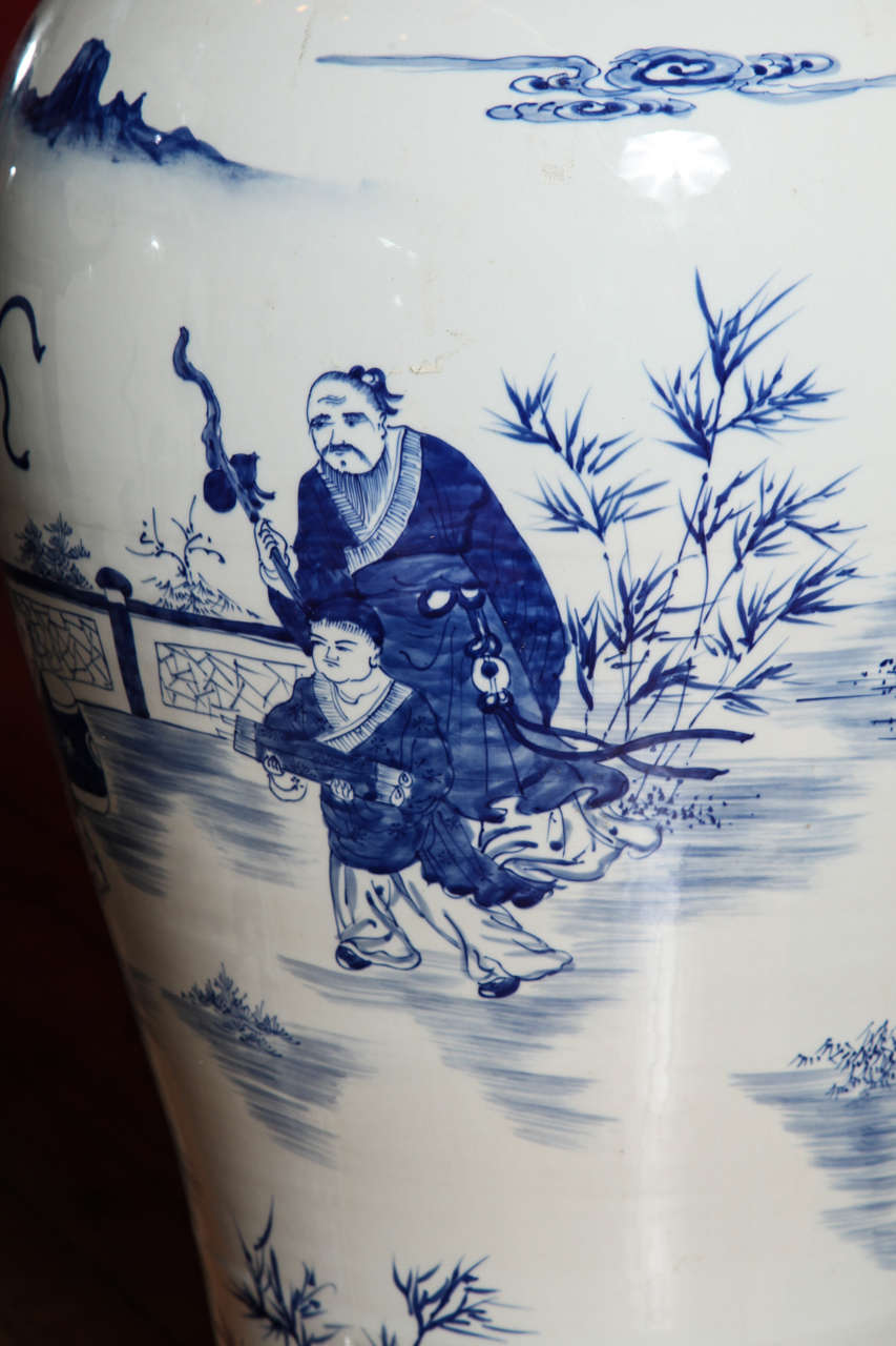 20th Century Pair of Hand-Painted Antique Chinese Blue and White Palace Jars with Characters