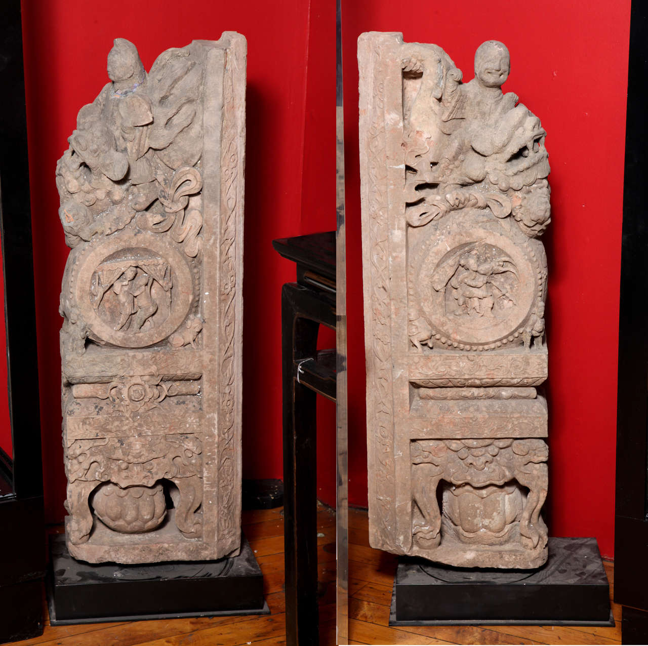 This rare pair of architectural stone carvings comes from a Chinese temple constructed during the Ming dynasty (1368-1644). Each carving is adorned with three registers, with the bottom displaying a monster figure of the antique taotie pattern,