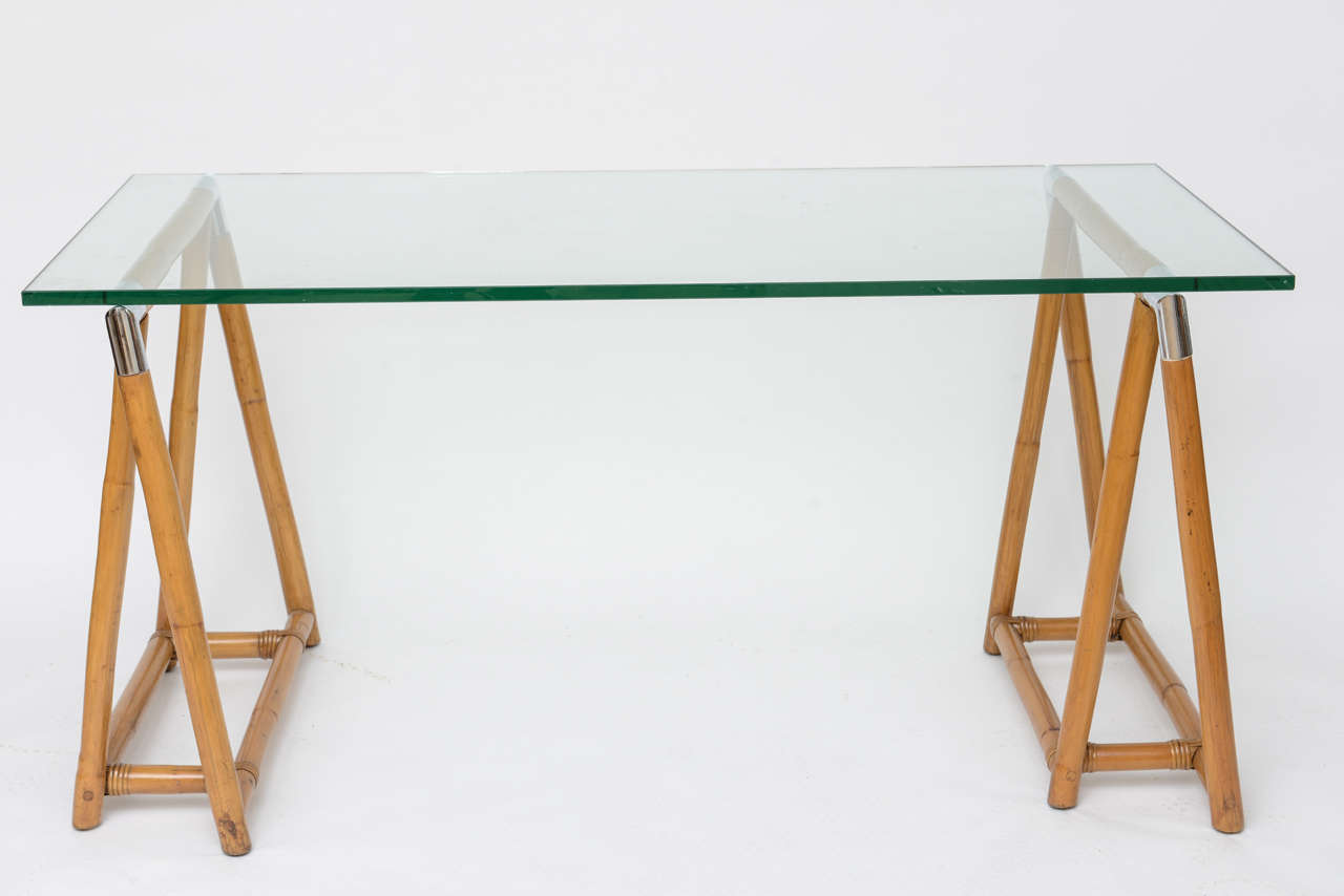 Bamboo Table with Glass Top and Chrome Corner Details.
