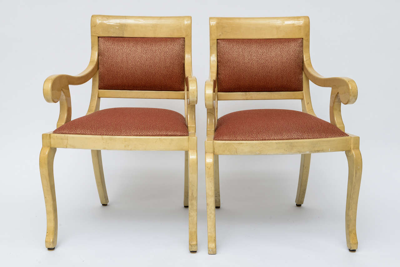 Pair of elegant Italian Aldo Tura Style Art Deco armchairs in lacquered goatskin.
The Side Chairs feature a sculptural Core with well-padded seat and backrest.
In good vintage condition with some marks and scratches to the lacquered Goatskin. 

