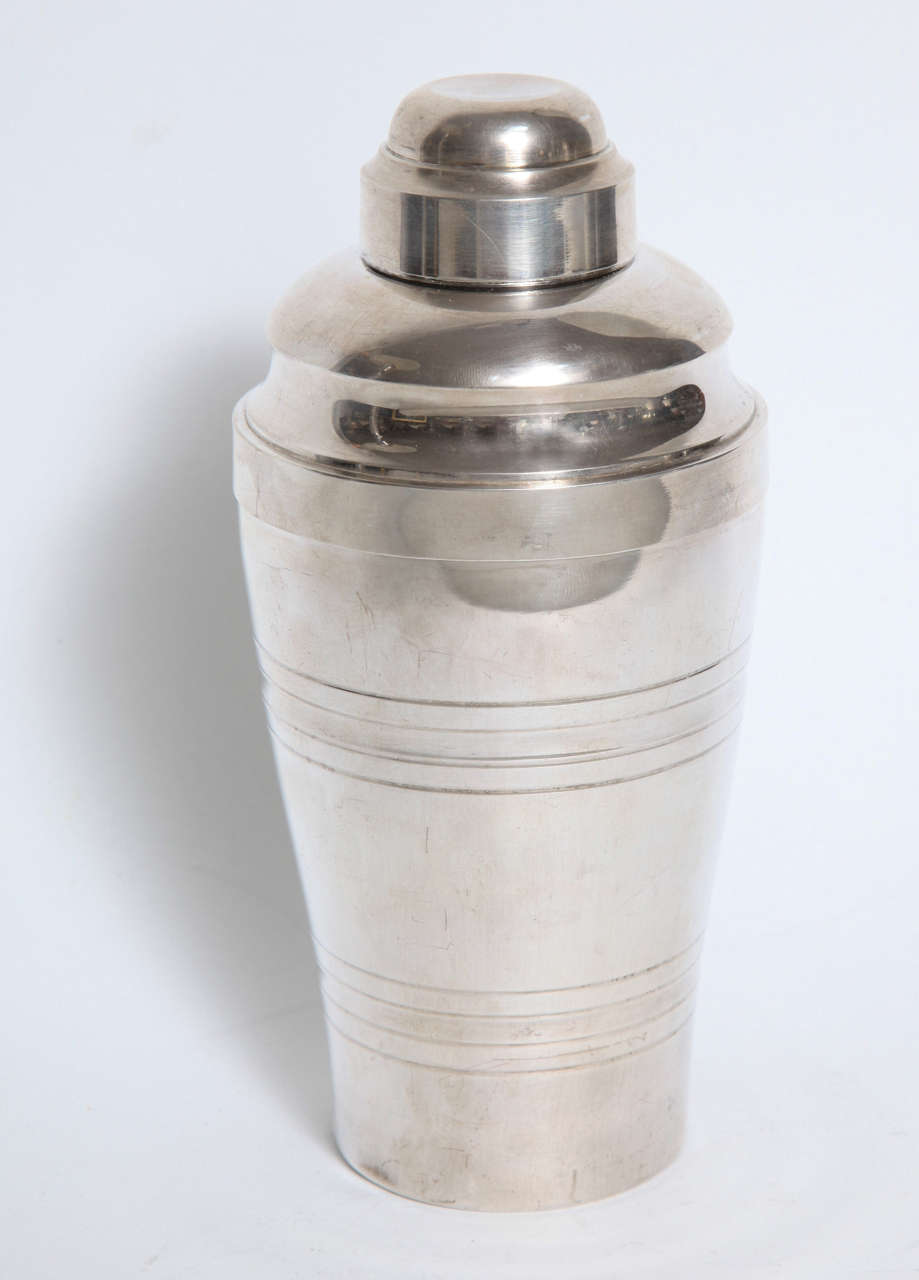 A rare St Medard silver plated cocktail shaker with juicer. Finely chased with two marks on the underside.