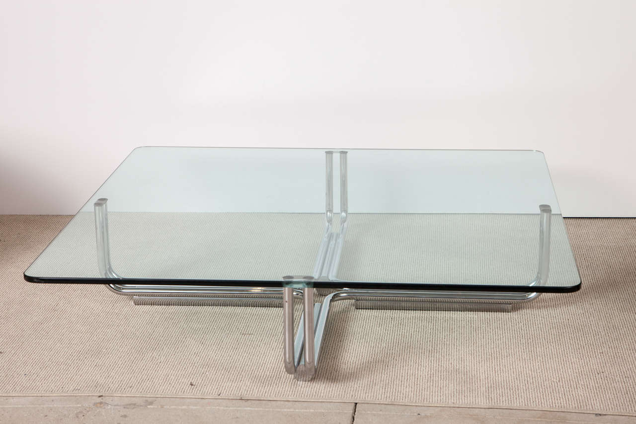 Exquisite chrome double band tube base and thick glass original top.

THIS ITEM IS CURRENTLY ON VIEW AT OUR MANHATTAN SHOWROOM: 
200 LEXINGTON AVE (33rd & LEX) - 10TH FLOOR, NYC.