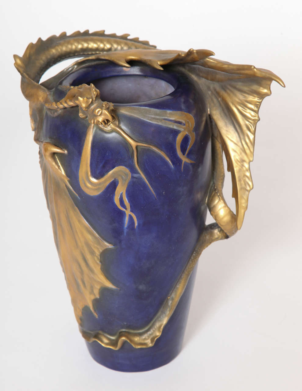 An Amphora Ceramic Dragon Vase, 1900, Austria. A Blue and Gold Winged Dragon Vase.