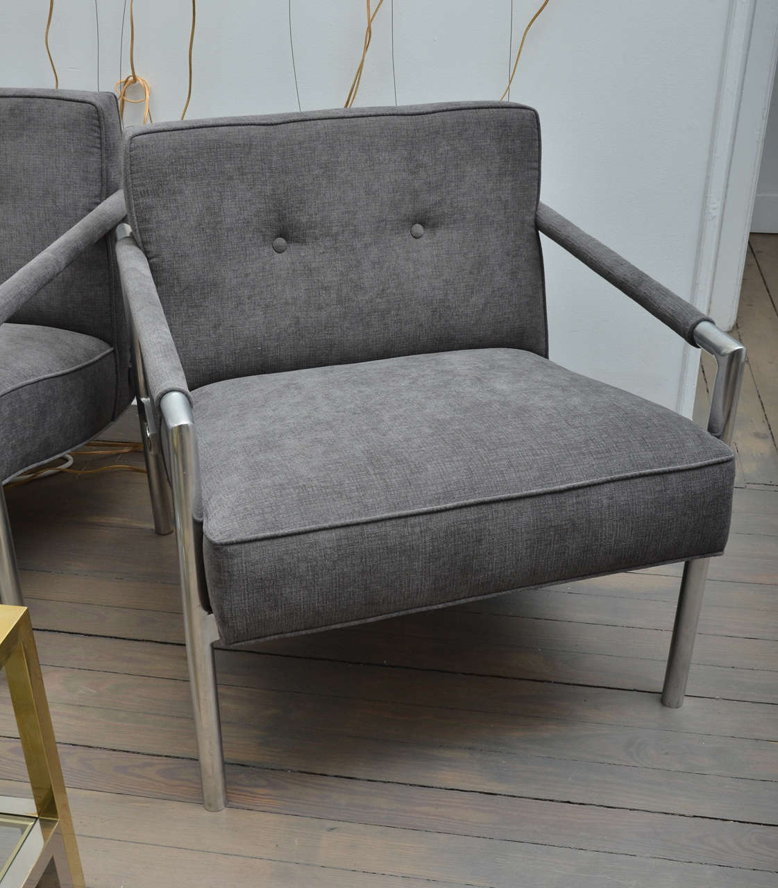 Pair of aluminum frame chairs upholstered in a soft grey corduroy in the style of Harvey Probber. Manufacturer, Founders Furniture Company.