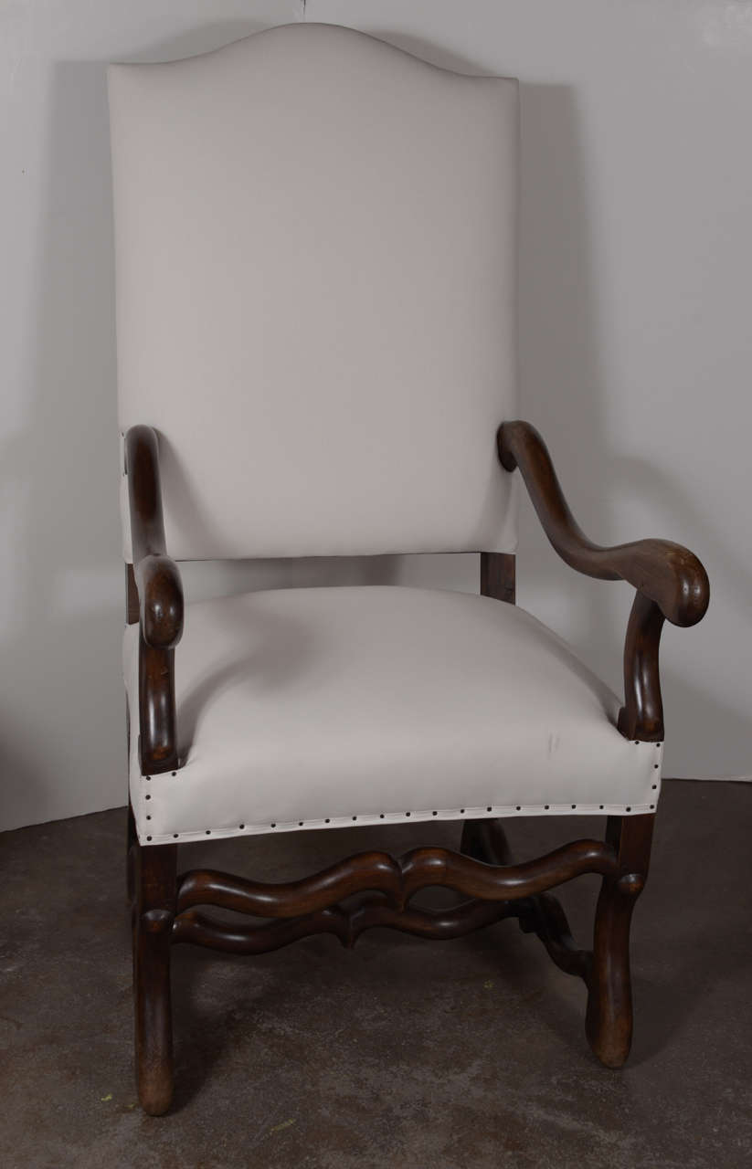 18th century walnut Os de Mouton chair from France. Recently reupholstered.