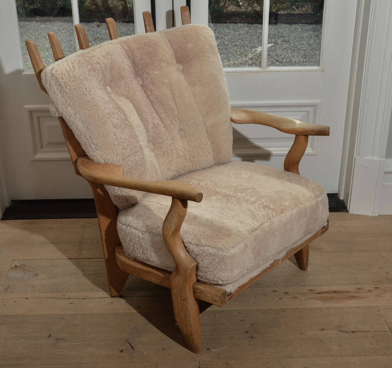 Stunning pair of Mid-Century Guillerme et Chambron oak Lounge Chairs newly re-upholstered in Lamb Shearling