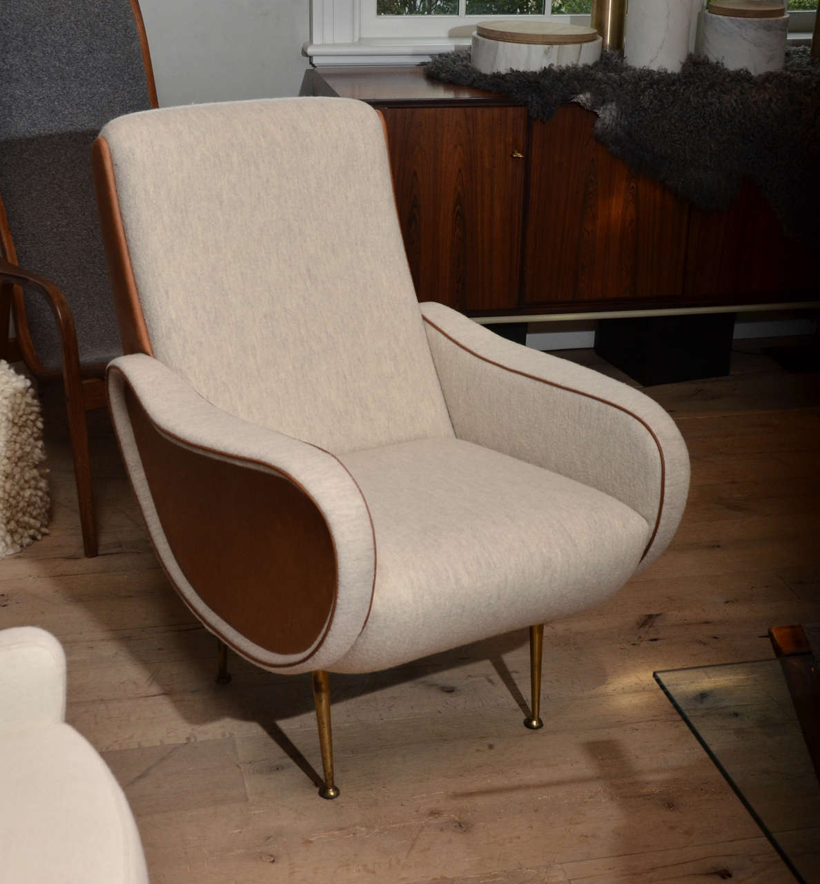 Stunning Mid-Century Italian Armchairs in the style of Marco Zanuso newly re-upholstered in a boiled wool with saddle calfskin leather Arm Detail and piping.