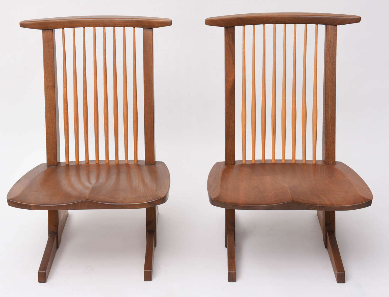 George Nakashima Conoid low chairs. A rarely seen design from the studio.