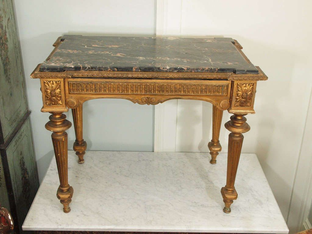 Louis XVI style 19th century marble topped gilt center table with drawer