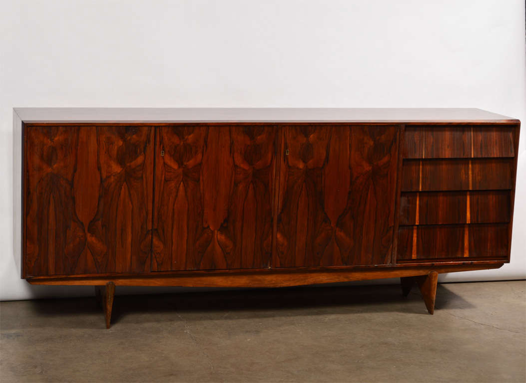 Credenza with three doors and four drawers in jacaranda. Designed by Martin Eisler for Forma, Brazil, 1950s.