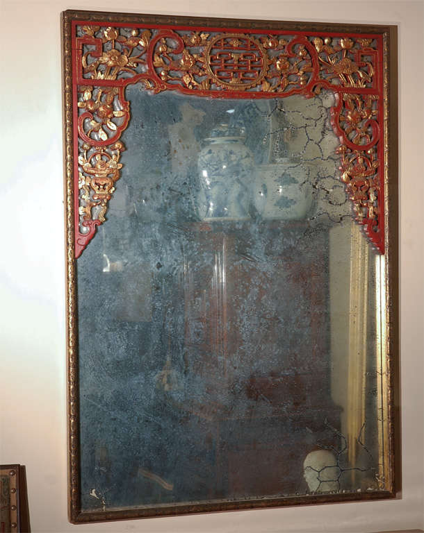 Oversized, hand-painted and gilded, Chinese-style mirror with original glass.