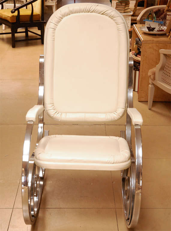 Maison Jansen rocking chair featuring an Art Nouveau inspired chrome frame and new white leather upholstery.