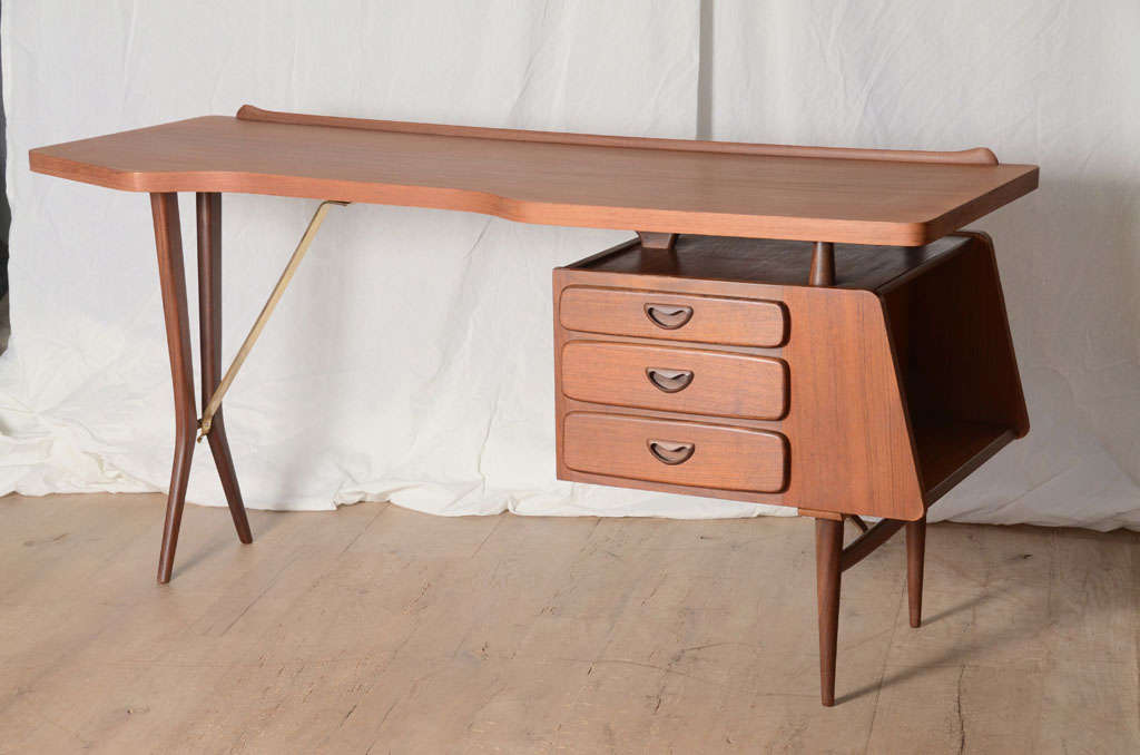 Italian Inspired Mid Century Teak Desk by Louis Van Teeffelen made for Webe
with Brass Stretcher