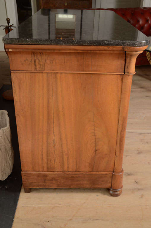 19th Century Empire period chest of drawers in walnut with marble top
