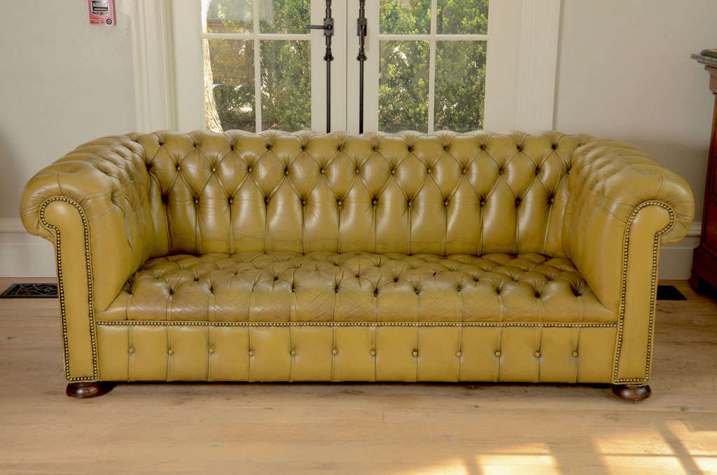 Wonderful mid century Chesterfield sofa in unusual chartreuse green color
 with nailhead detail