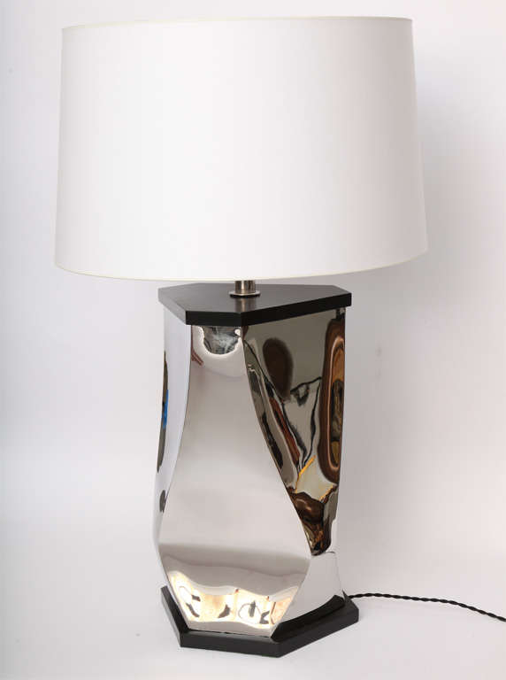 A 1980s sculptural table lamp by Michael Aram.
Shade not included