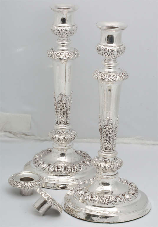 Unusually tall pair of sterling silver, Georgian candlesticks, made in the city of Sheffield, England, 1818, John & Thomas Settle, makers. Lovely design; removable bobeches. Each measures: 13 inches  high x 6 inches diameter across base. Weighted.