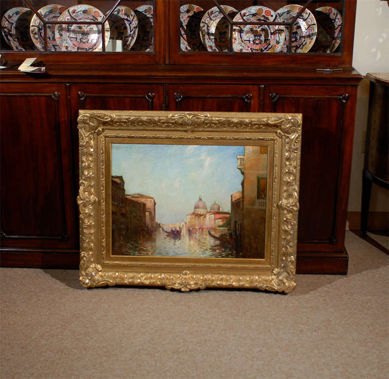 A large gilt wood framed oil on canvas venetian landscape painting, signed 