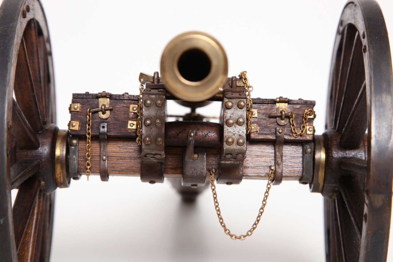 A Pair of Edwardian Mahogany and Brass Model Cannons 5