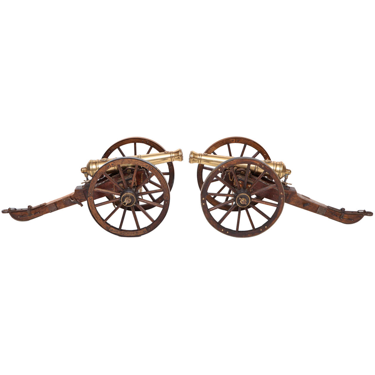 A Pair of Edwardian Mahogany and Brass Model Cannons