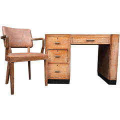 A limed Oak Desk and matching Chair attributed to Heals and Sons,