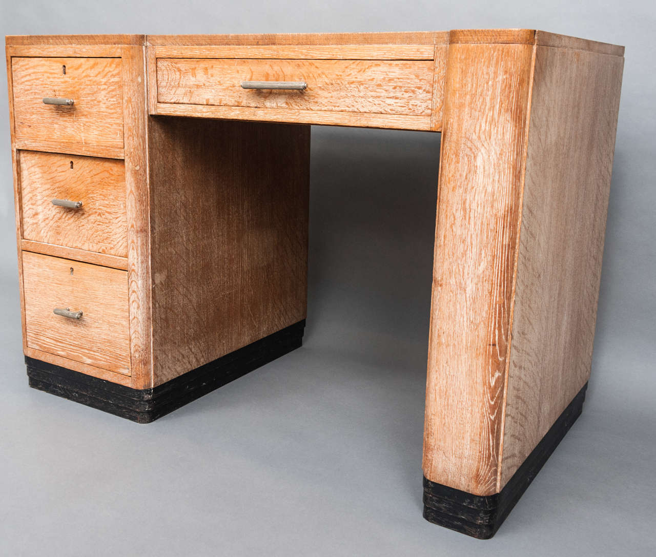 A limed Oak Desk and matching Chair attributed to Heals and Sons, In Good Condition In Macclesfield, Cheshire