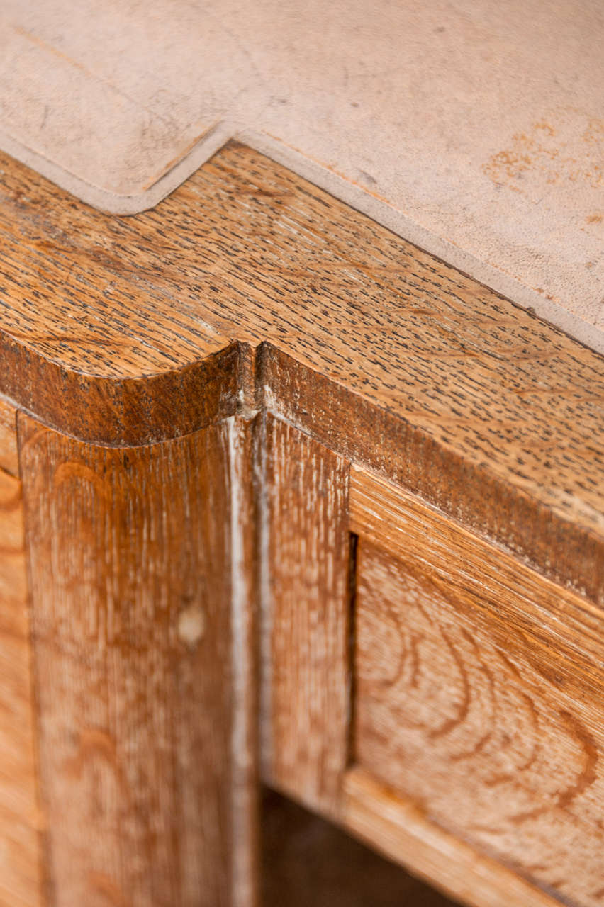 Mid-20th Century A limed Oak Desk and matching Chair attributed to Heals and Sons,