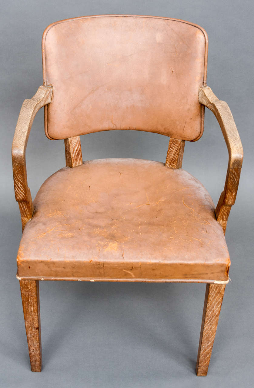 A limed Oak Desk and matching Chair attributed to Heals and Sons, 2