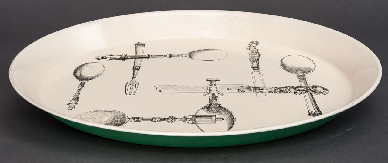 A Piero Fornasetti Tray of oval form.