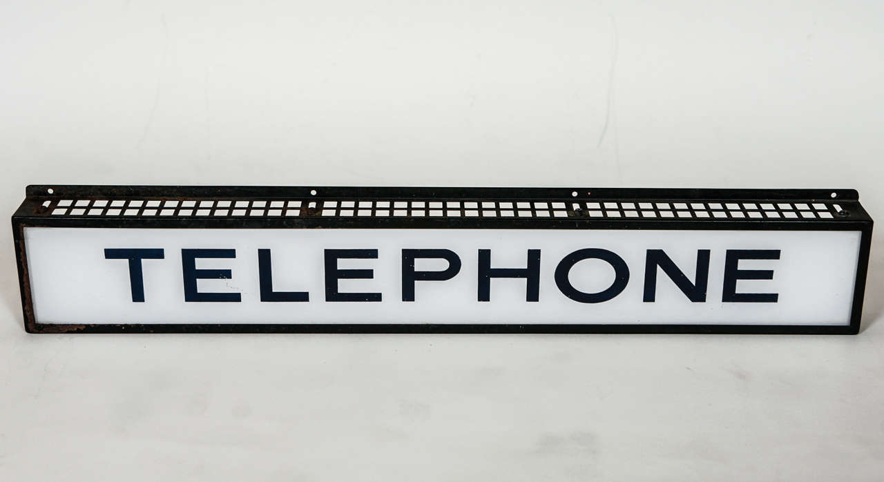 An old telephone sign, perhaps out of a hotel or restaurant was in a shinny metal phone booth at one time. The sign will make an interesting little feature and you could add some lighting to give it even more presence. Jefferson West antique offer a