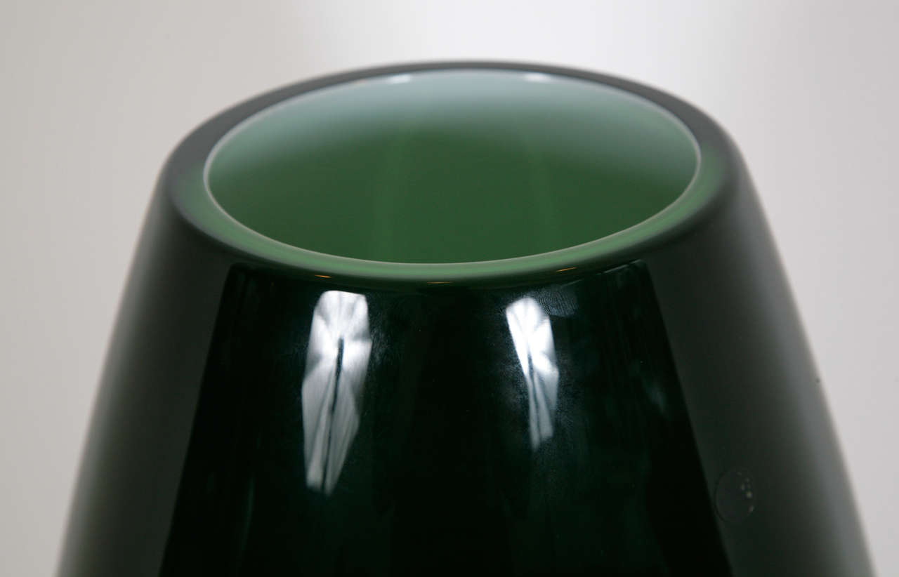 for Salviati, 2001
Ovoid glass vase, with opalescent glass layer cased in apple green glass, and outer black glass layer, cut back to reveal apple green glass.
Note: Simon Moore was the creative director at Salviati from 1999-2001