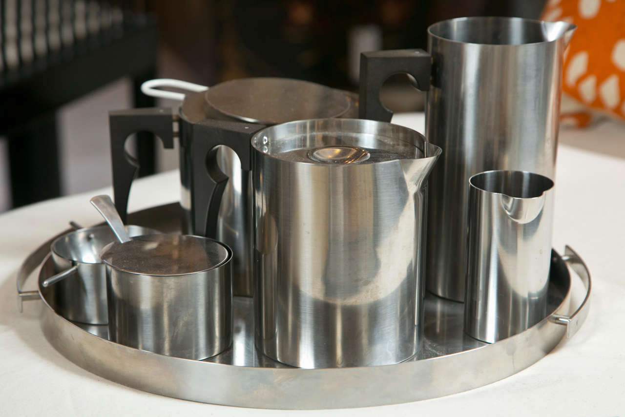 Modern stainless steel Stelton tea set,  seven piece with wood handles,